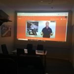 GoFly360 online lessons projected on wall